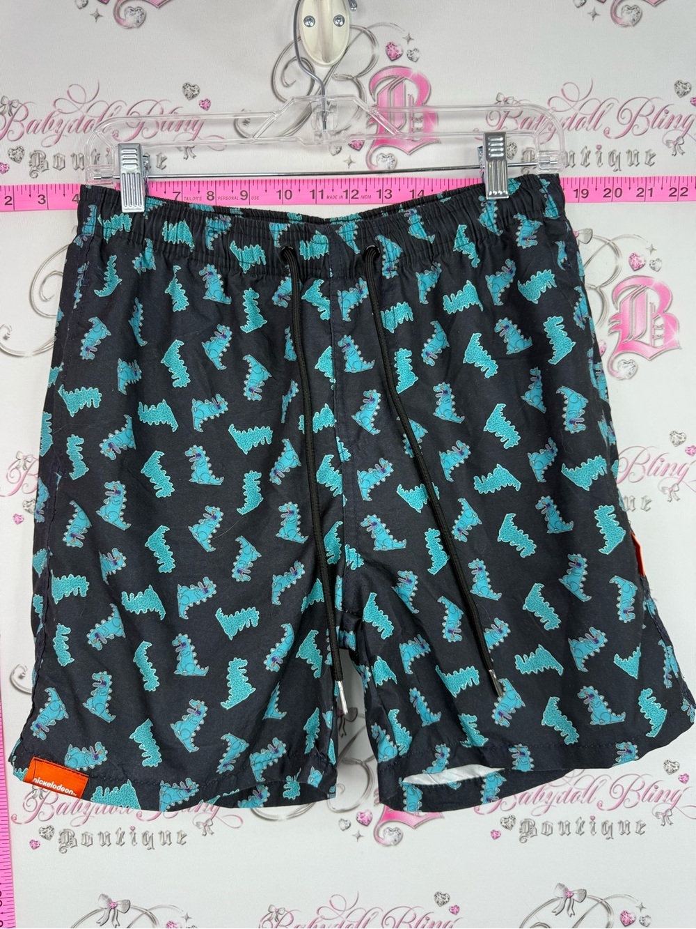 Nickelodeon dinosaur shorts beach Black Athletic Shorts with Teal Dino Print